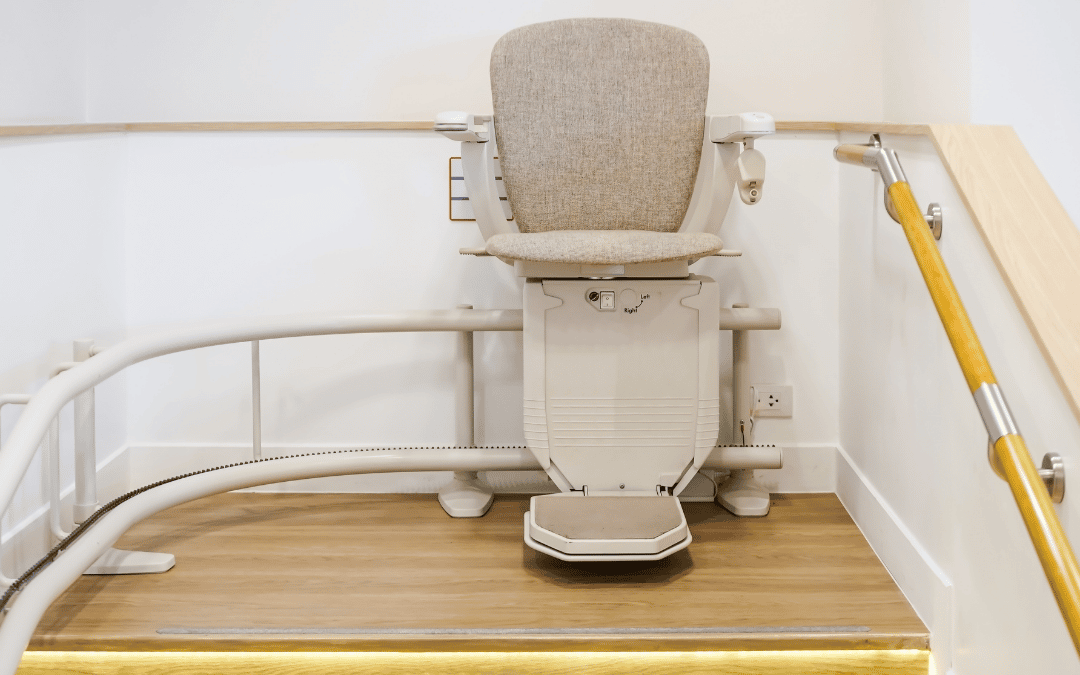 a new stairlift chair with legrest at the top of a curved stairway